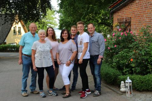 a group of people posing for a picture at Ferienhof Lucht in Mühbrook