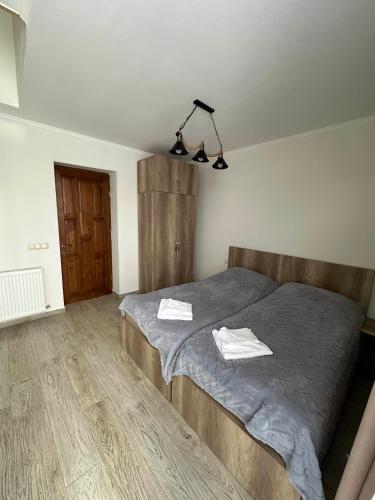 Postel nebo postele na pokoji v ubytování Mount Cottages Bakuriani