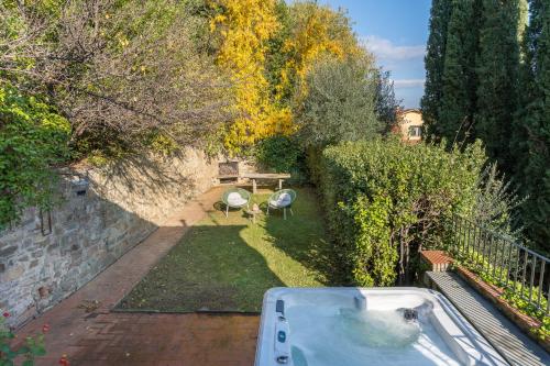 an aerial view of a backyard with a hot tub at Private Jacuzzi - Villa Bellosguardo in Florence Historic Center in Florence