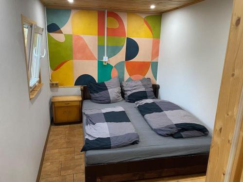 Katil atau katil-katil dalam bilik di Cozy Tiny House mit WLAN & Sauna