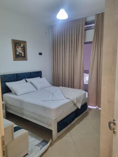 Un pat sau paturi într-o cameră la Easy Escape
