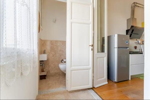 Kuchyňa alebo kuchynka v ubytovaní Appartamento a 150M dal Duomo
