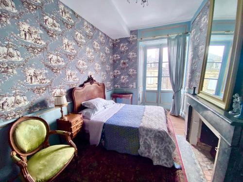 Ένα ή περισσότερα κρεβάτια σε δωμάτιο στο L'Hotel de Hercé Chambre d'Hote