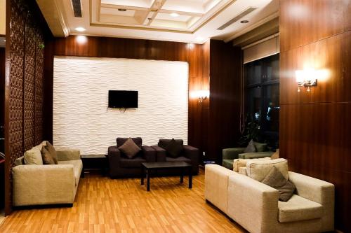 Et opholdsområde på فندق مسارات المشاعر