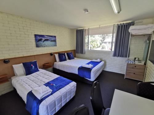 Postel nebo postele na pokoji v ubytování Aquajet Motel