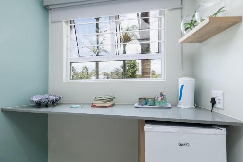 Una cocina o cocineta en The Notebook Hotel
