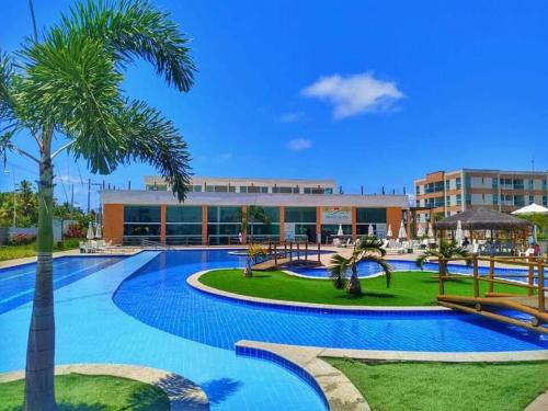 Kolam renang di atau dekat dengan Muro Alto Condomínio Clube - Flat