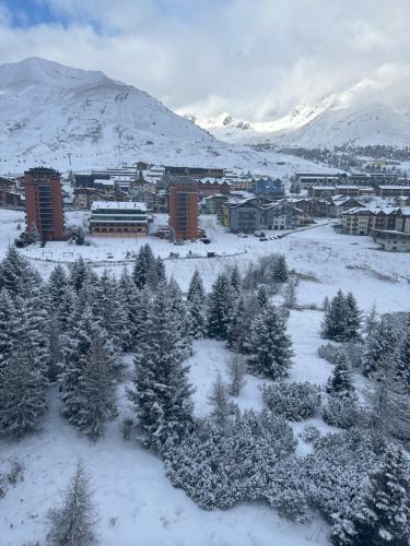 an aerial view of a city in the snow at BELLAVISTA APARTMENT in Passo del Tonale
