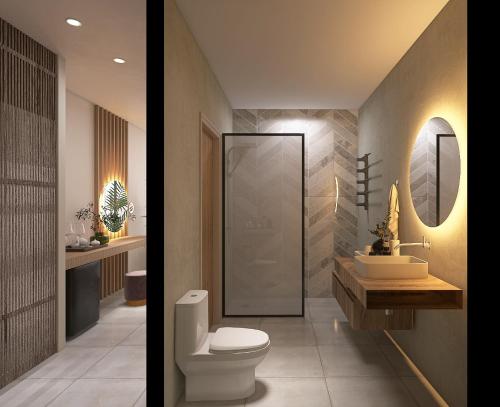 two pictures of a bathroom with a toilet and a sink at South Coast Hotel in Makry Gialos
