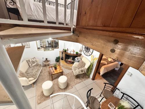 an overhead view of a living room with a fireplace at Julie's Home in Kalavrita