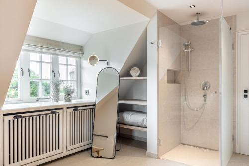 Koupelna v ubytování Ferienhaus ToHus - Traumhaus am Wattenmeer in Keitum, Sylt