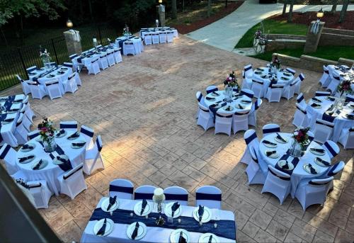 an overhead view of a group of tables and chairs at Whisper Chateau Weddings Reunions Groups 75 Plus in Greensboro