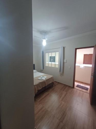 A bed or beds in a room at Pousada Estrela Mares Suíte 204