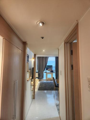 a hallway leading to a living room with a view at Wooyeon in Seongnam