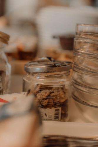 a jar of food sitting on top of a counter at Guesthouse Giulietta e Romeo in Cossogno