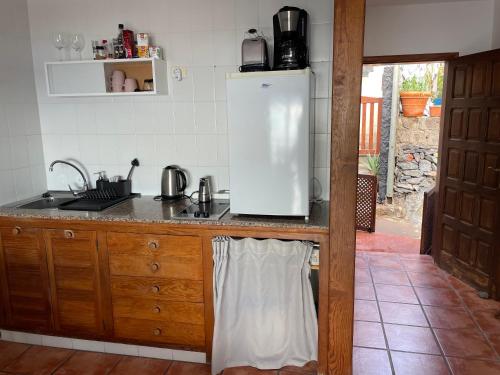 Η κουζίνα ή μικρή κουζίνα στο Casa Estefano Policarpo Hostel für Wanderer