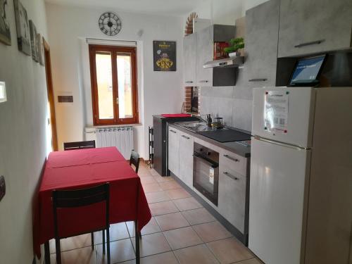 Kuchyňa alebo kuchynka v ubytovaní La Casa dei Bersaglieri
