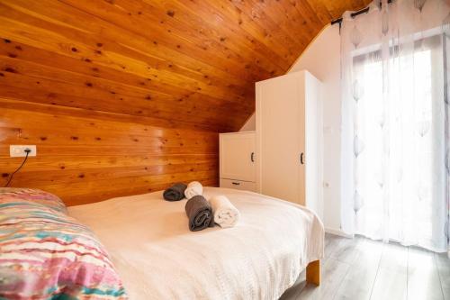 Ένα ή περισσότερα κρεβάτια σε δωμάτιο στο Casa Foresta