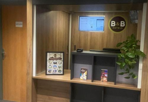Certifikát, hodnocení, plakát nebo jiný dokument vystavený v ubytování B&B HOTEL Saint-Etienne Monthieu