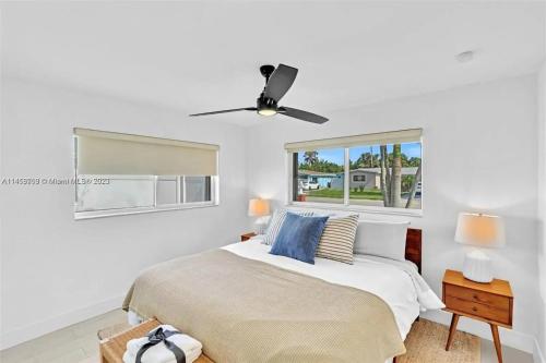 Ένα ή περισσότερα κρεβάτια σε δωμάτιο στο Live a Comfortable Stay at this Charming House