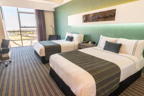 Katil atau katil-katil dalam bilik di Sonesta Hotel Arequipa
