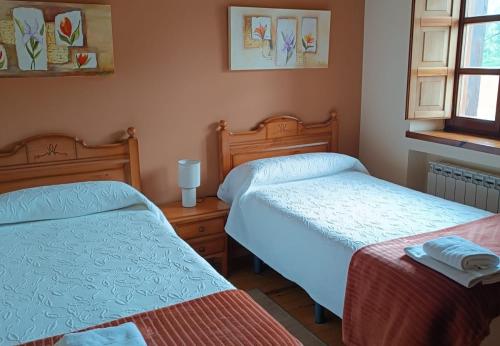 Postel nebo postele na pokoji v ubytování Casa Rural Valle Tosande