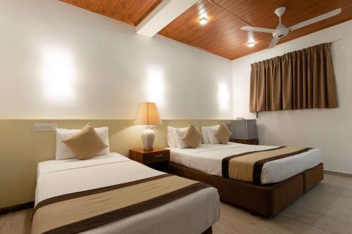 Postel nebo postele na pokoji v ubytování Beach Corridor Hotel & Spa with Free Airport shuttle