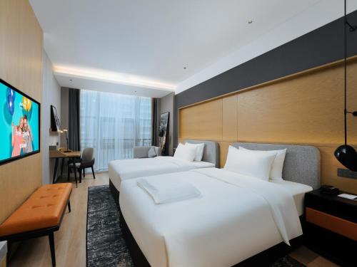 TV/Unterhaltungsangebot in der Unterkunft Park Inn by Radisson Nanjing North Zhongshan Road