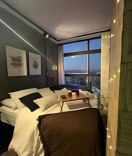 Cama o camas de una habitación en Andar 41
