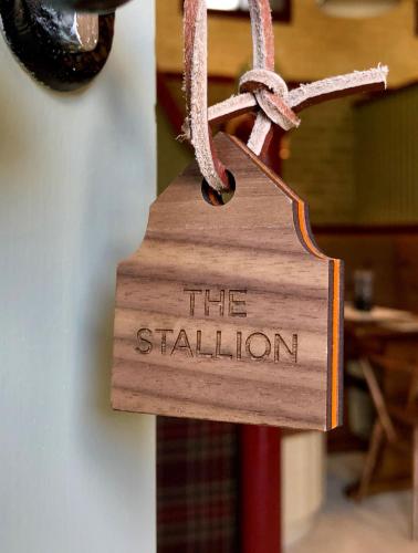 a wooden tag that says the stallion on a string at The Steed in Matfen