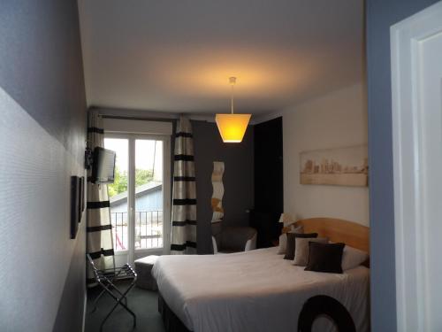 Postel nebo postele na pokoji v ubytování Hotel le Broceliande - Sure Hotel Collection by Best Western