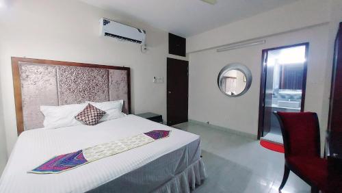 Katil atau katil-katil dalam bilik di Luxurious apartment at Dhaka