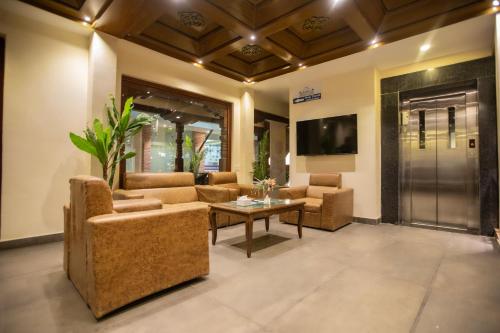 Capital Boutique Hotelにあるテレビまたはエンターテインメントセンター