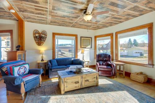 a living room with chairs and a ceiling fan at Downtown Red Lodge Home - 8 Mi to Skiing! in Red Lodge