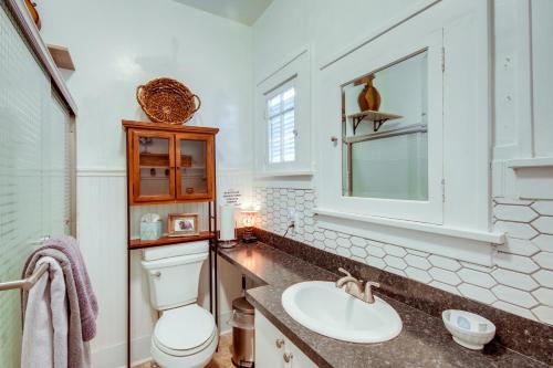 a bathroom with a toilet and a sink at Downtown Red Lodge Home - 8 Mi to Skiing! in Red Lodge