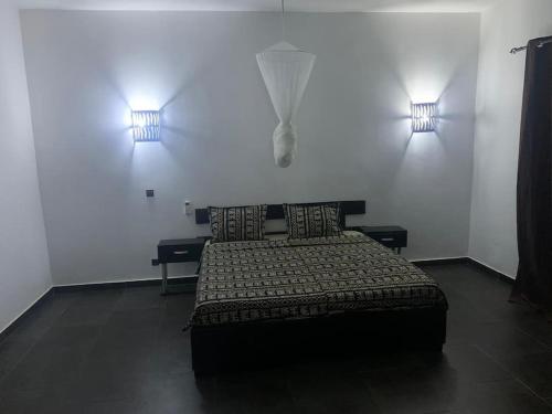 Llit o llits en una habitació de Palace Baobab