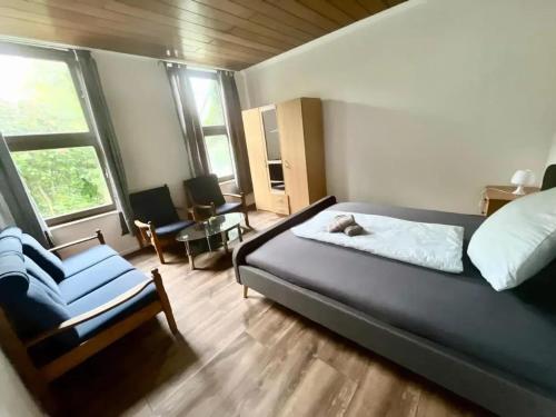 Posezení v ubytování Charming apartment near Emden with garden, 100 m²