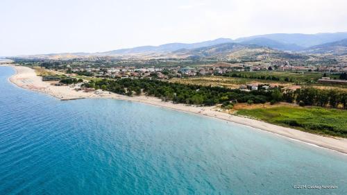 an aerial view of a beach and the ocean at San Rocco residence one bed apartments 1A2 4 in Isca sullo Ionio