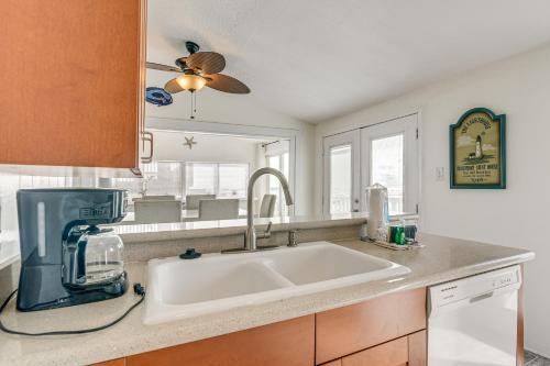 a kitchen with a sink and a counter top at Oceanfront Galveston Home on Terramar Beach in Galveston