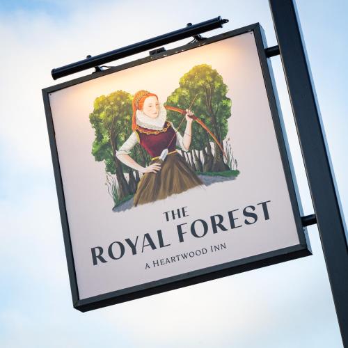 a sign for the royal forest a herbologicalivist inn at The Royal Forest - A Heartwood Inn in Chingford