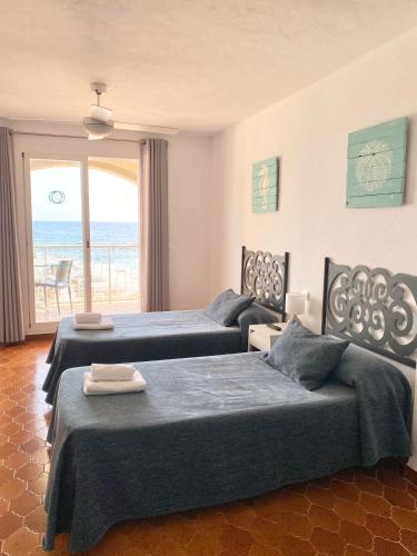 Postel nebo postele na pokoji v ubytování Zodiac Apartments