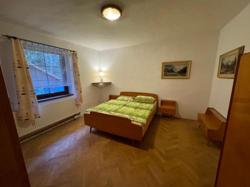 Postel nebo postele na pokoji v ubytování Apartmán U Vachtů