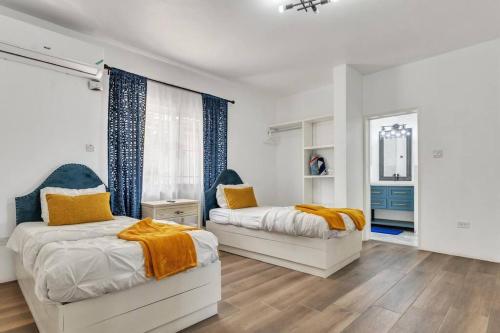 Postel nebo postele na pokoji v ubytování Mosaic luxury Villa