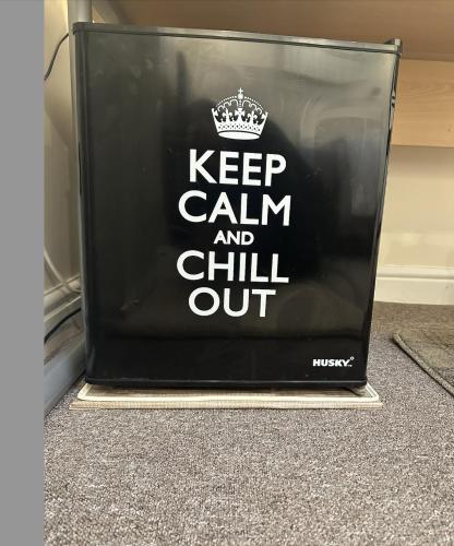 a sign that says keep calm and chill out at Newly Built Private Ensuite Room in Manchester