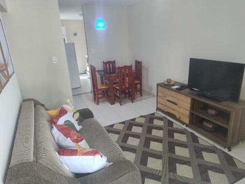TV a/nebo společenská místnost v ubytování Cantinho Família Amada Próx ao Hospital HTO LINDU - Paraíba do Sul