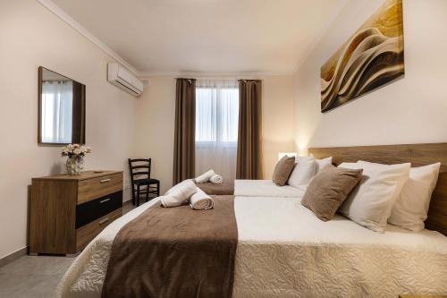 Postel nebo postele na pokoji v ubytování Luxurious & Spacious 1BD Stay at The Podium - Yacht Marina Area