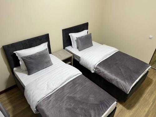 Katil atau katil-katil dalam bilik di Shosh Apartments