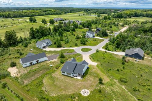 an aerial view of a home with a road and houses at Orchard View Retreat by Simple Life Rentals in Egg Harbor