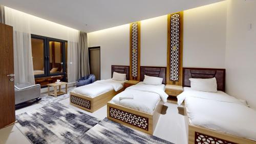 Postel nebo postele na pokoji v ubytování استراحة دهجان Dehjan chalet