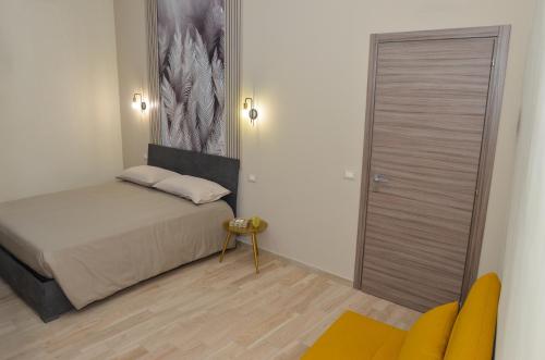 Ένα ή περισσότερα κρεβάτια σε δωμάτιο στο Stella Mia Luxury Rooms